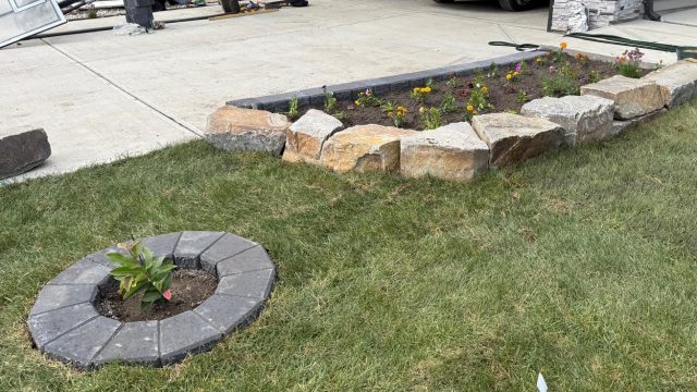 Natural rocks flower bed on front side 2025